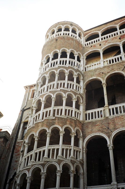 This spiral staircase is called "Scala Contarini del Bovalo." The word "bovalo" means "snail" in Italian. The unique staircase connects the floors of the small Contarini palace near the Rialto Bridge.