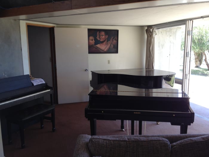 View of one of the common rooms in residence area. Individual apartments are small so areas, like living rooms, are shared.