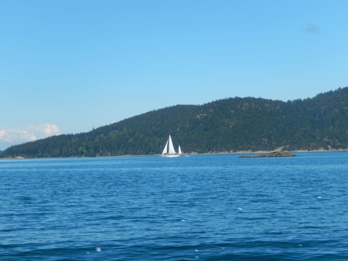 Elegant sailing vessels ply the waters of Rosario Strait, but if you're in your own power boat, remember sailboats have the right of way.