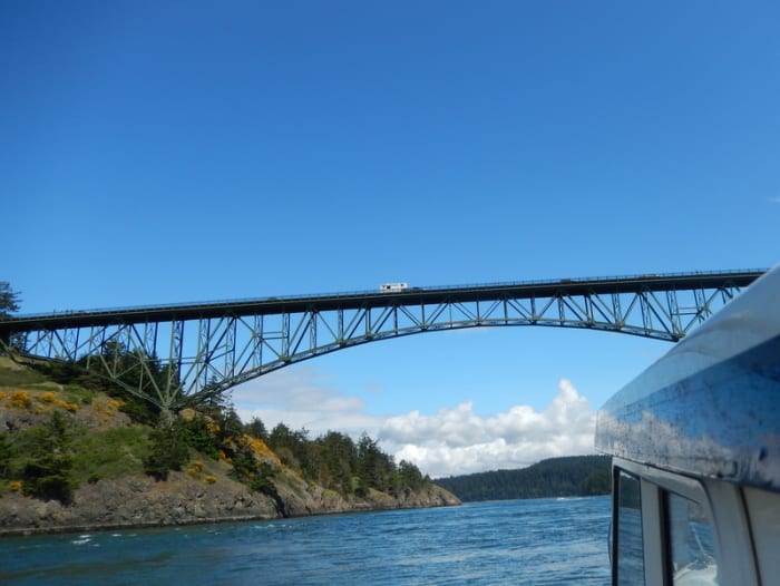 The view from our small boat's pilot house shows the fine lines of Deception Pass Bridge on Highway 20, spanning the strait between Fidalgo Island and Whidbey Island, leading to Cornet Bay.