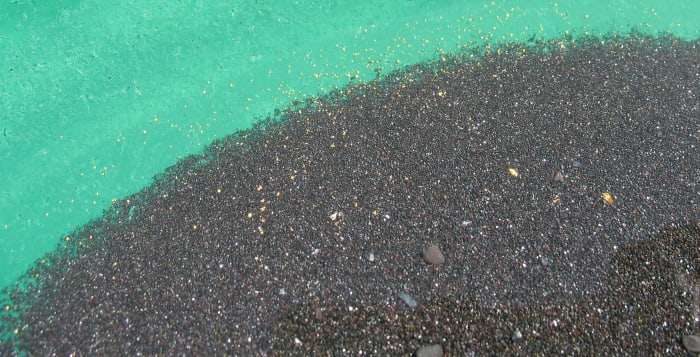 Black iron with gold flakes