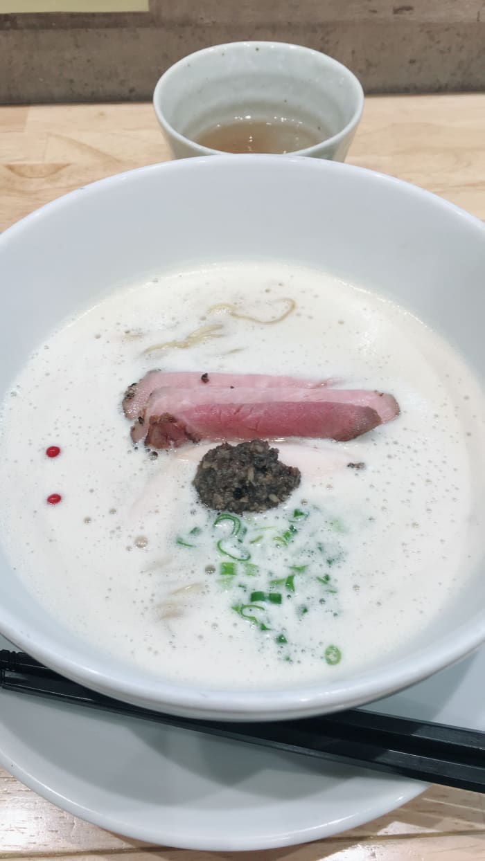 A new type of ramen: Fish and chicken bone broth ramen covered with a froth that is supposed to make soup coat the noodles well. Served with cold cuts and a truffle sauce