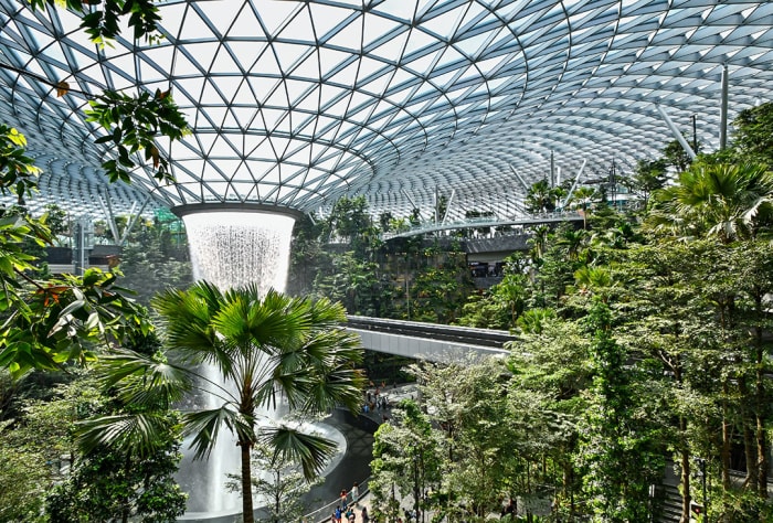 The tiers of the Shiseido Forest Valley form a verdant bowl of which the heart is the HSBC Rain Vortex.