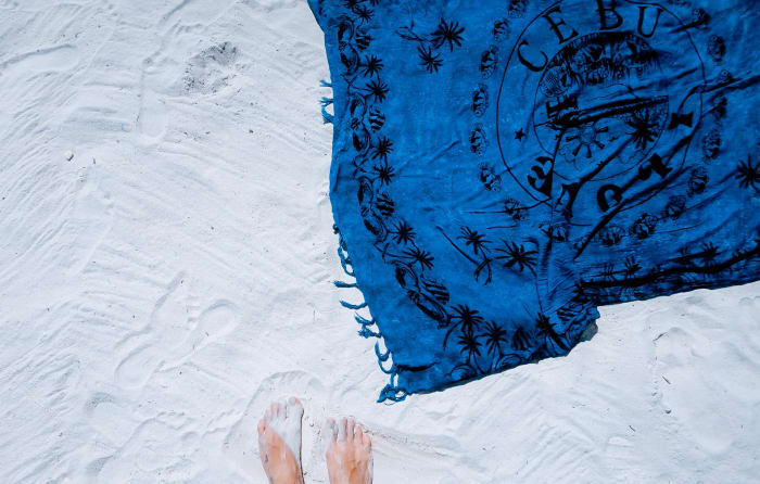 Is this just a beach blanket? Or, is it also a scarf, dress, towel, and skirt?