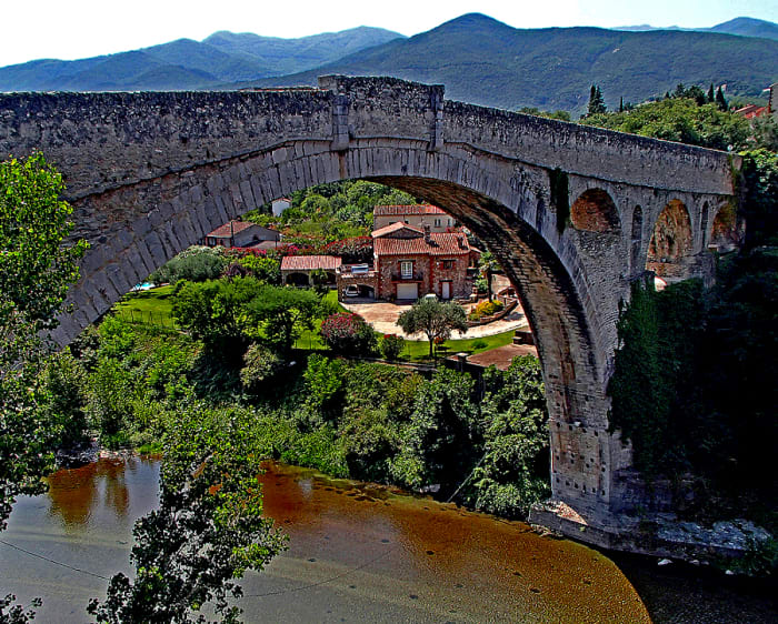 A bridge that magically appeared out of nowhere centuries ago. Whether you believe it or not, it's definitely worth a trek across!
