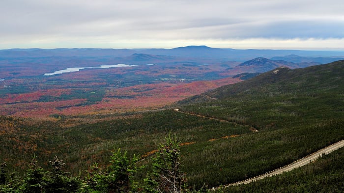 The view from the top of Whiteface Mountain after driving up the Veteran's Memorial Highway. In the distance, the orange, yellow and red trees beamed.