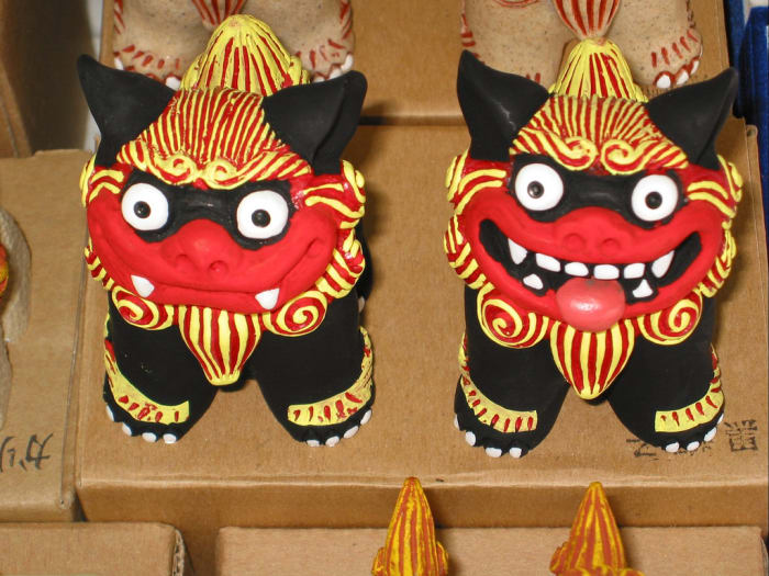 A beautiful pair of Shisa. Notice the guardian dog on the left has a closed mouth, while the one on the right has it's mouth open. Tradition states that this is how Shisa should be positioned.