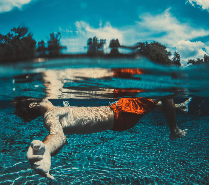 In a dream, the surface of water might be like the dividing line between conscious and unconscious thoughts, feelings, and memories.