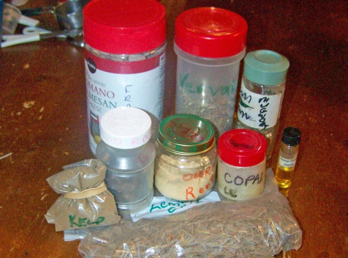 I like to recycle. I use old spice jars, babyfood jars, or any container I can clean and recycle. You can see my frankincense there in an old Parmesan cheese container. And some things I keep in plastic baggies.