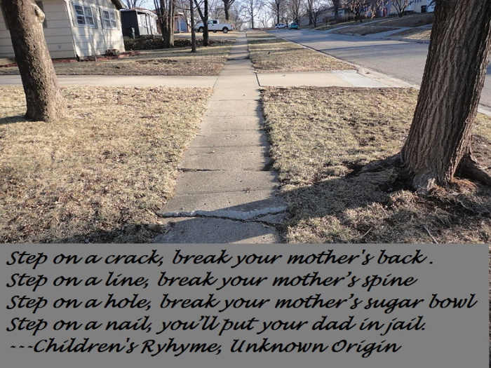 The origin of step on a crack, break your mother's back may simply just be words that rhyme.