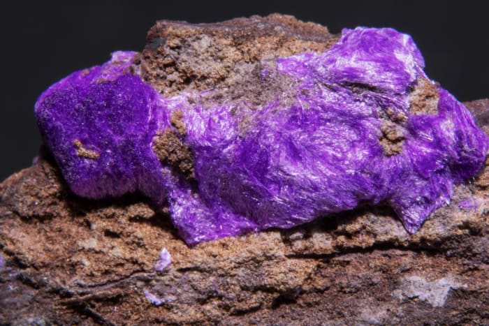 Sugilite is a purple crystal linked to forgiveness, emotional healing and jealousy.