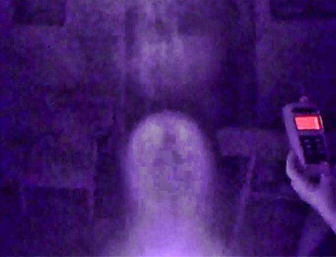 Michael Henderson captured this stunning full spectrum camera still in the parlor of the home during our investigation. Several anomalies are visible including a defined male head lingering above a ghost child.