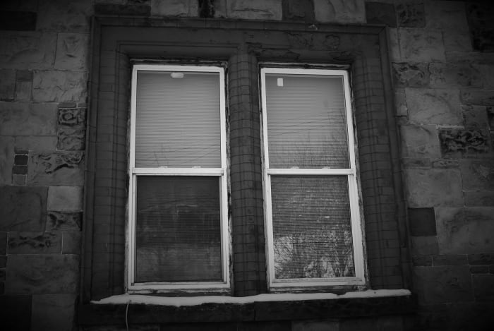 The window where, for Years, people have reported seeing the ghostly image of an old woman looking out at the street.
