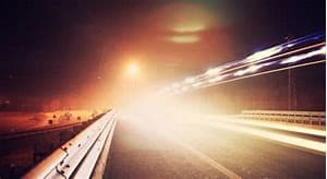 Blinding lights on an otherwise dark highway can be alarming. They can also, at times, be someone's way of saying goodbye.