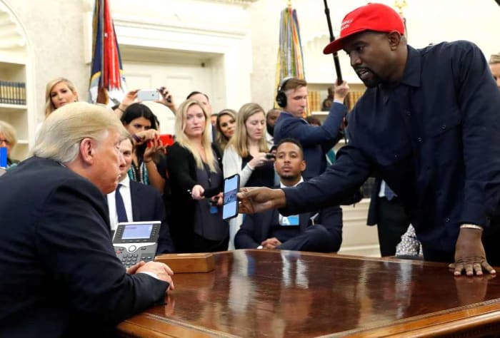 Gemini plus Gemini is a media circus. Kanye West in the Oval Office tells President Trump, "I think of you like a father" on October 11, 2018.
