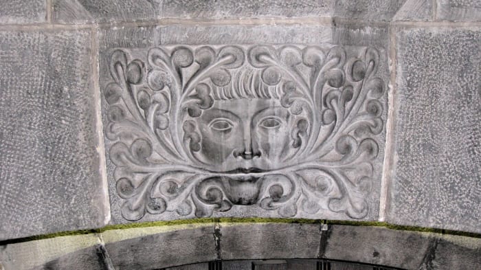 The pagan Greenman who guards the entrance to the crypt, the oldest part of the cathedral in Gent Belgium.