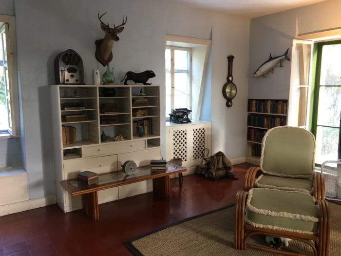 Interior of the Hemingway House in Key West. The writer had strong associations with the area, often Wintering there, and he would often frequent the local bar, Sloppy Joe's. He would also undertake fishing trips with friends.