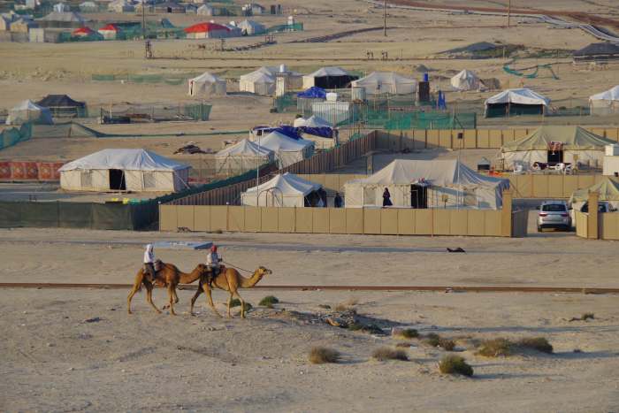 A view from the mid-way point of the hill. Camels walk pass by our camp in the background (December 2015).
