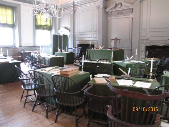 The Assembly Room in Independence Hall where all the work was done on the Constitution. The room is stark and dull by our standards, with some chairs, tables and a few ink wells. To look at it, you'd never think it had so much significance.