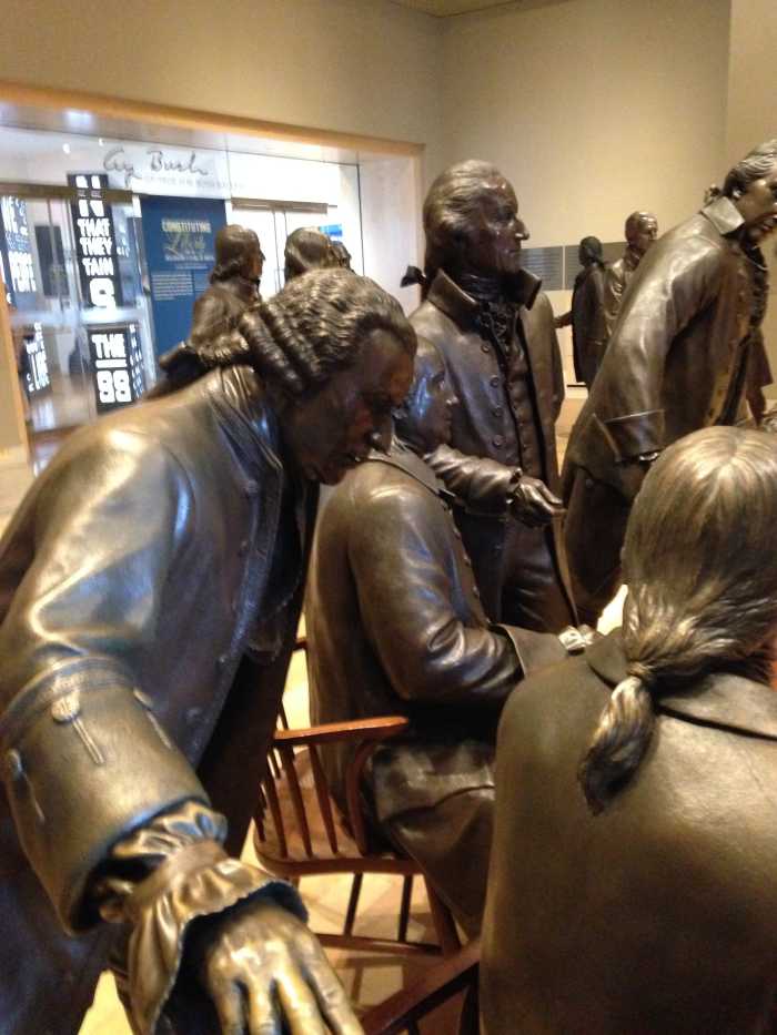 Representatives from each colony in bronze inside the Constitution Center, positioned as they were when they ratified the most important document in our history.