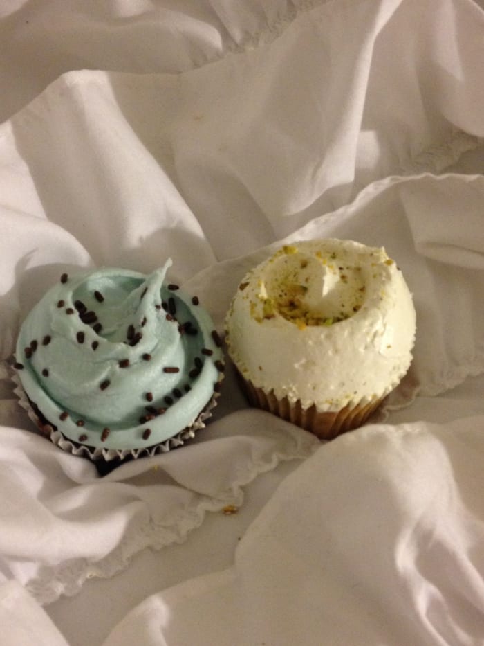 Pistachio and Chocolate Vanilla Buttercream cupcakes from Magnolia's Bakery in Times Square (more precisely Rockefeller Center)