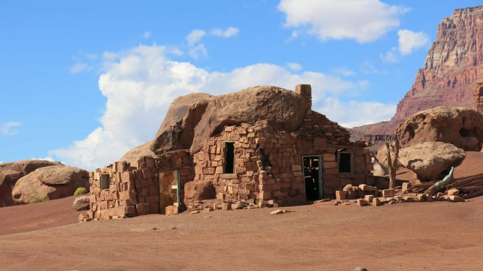 Largest, and probably the first shelters the Russell's constructed by building rock wall between ground and overhang of 2 large adjoinginf boulders.