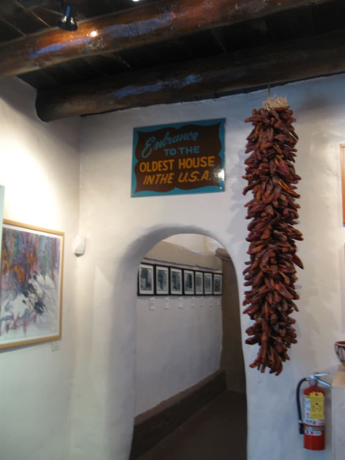 Entering Museum portion of Santa Fe's Casa Vieja de Analco from the gift shop.