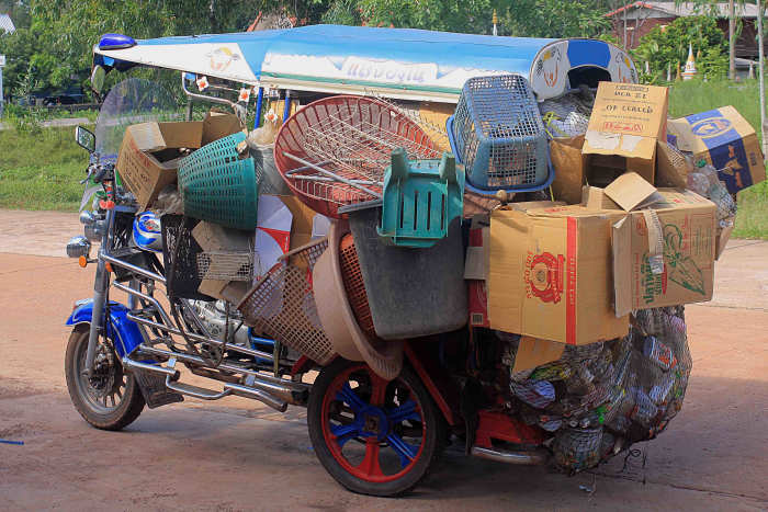 In the cities, the motorised tricycle known as a tuk-tuk is used as a taxi, but in the villages it may be used for transporting goods ...