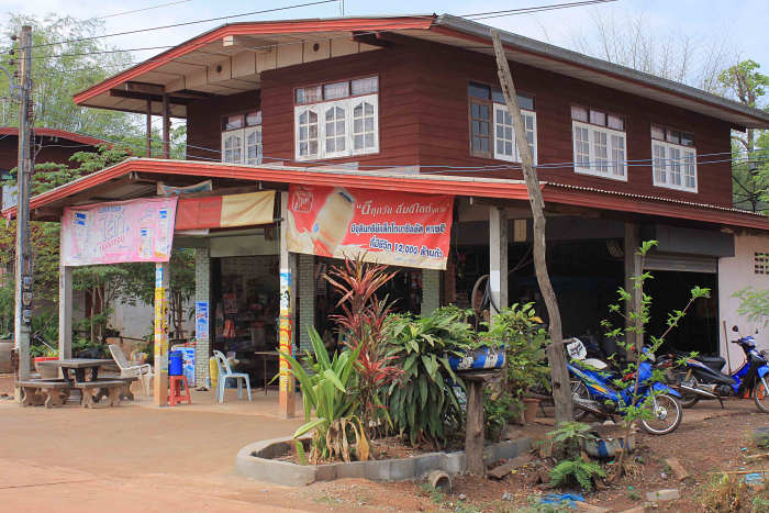Typical village dwelling in modern day Thailand. Alisa's home, like most in the village, once consisted of a one story building on stilts to protect against flooding. More recently, the lower story has been enclosed to provide extra living space