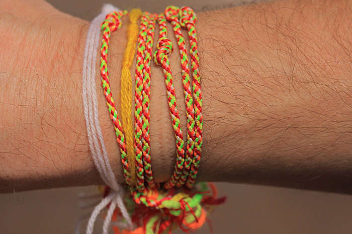 Leaving the village at the end of my stay would be ceremonised by the tying of strings around the wrist by the family, accompanied by an oral blessing. The strings symbolise good luck; I found the ceremony rather touching and beautiful