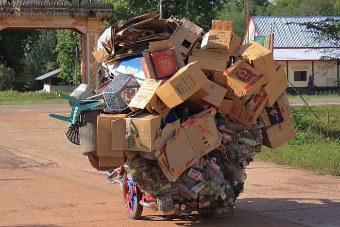 ... An awful lot of goods! This guy collected junk. Not sure what he did with all the old junk. Maybe he recycled it, or just sold it for scrap? But click to blow the image up for more detail - see it to believe it!