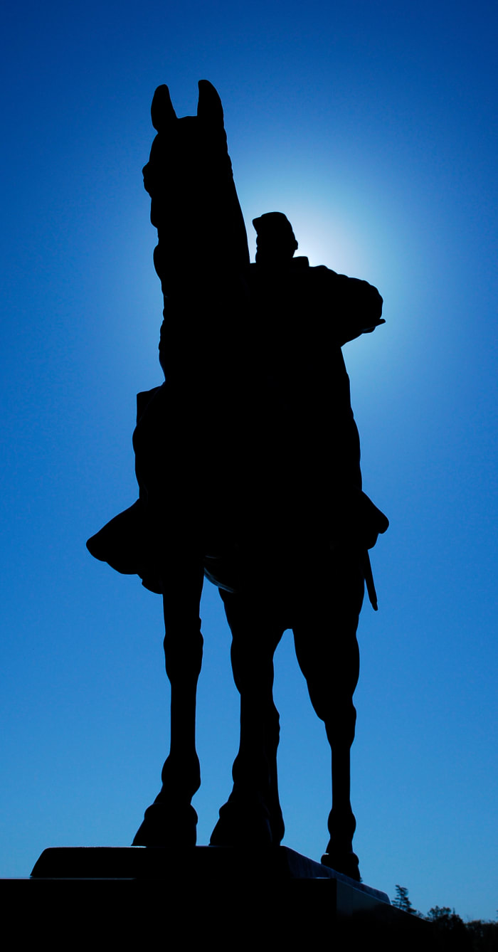 Stonewall Jackson's Statue is one of my favorites. I like the silhouette created by the sun. Changing the f-stop would create a sunburst effect.