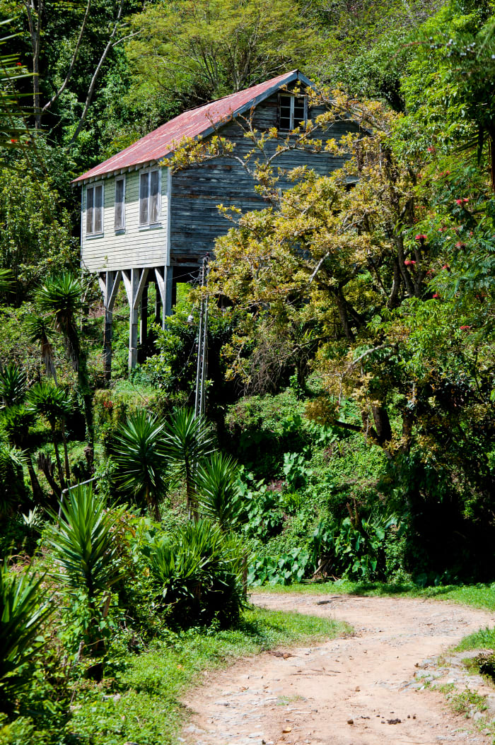 A house on stilts. One of many on the road between San Juancito and Tegucigalpa.