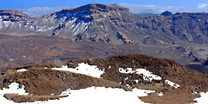 Mount Guajara and the Las Cañadas escarpment. In the foreground are the remains of a former crater of Mount teide, upon which the present cone developed
