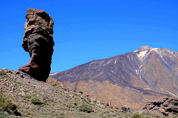 The most famous 'picture postcard' image of Mount Teide features the standing stone of Roque Cinchado in the foreground
