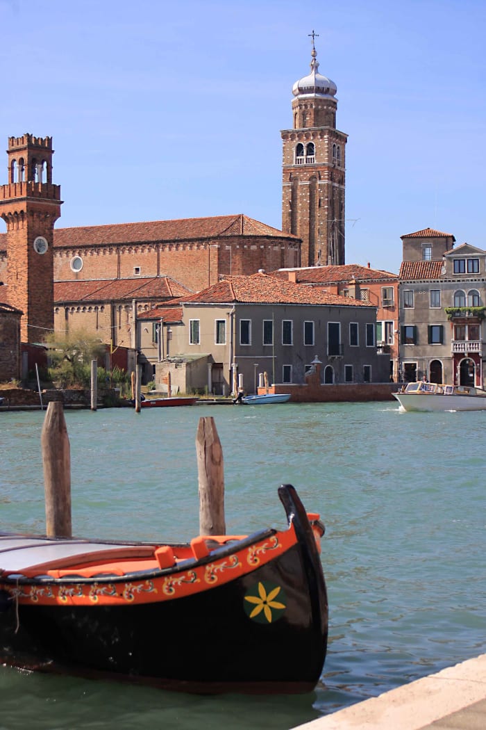 One of the wide waterways of Murano. The tall bell tower right of centre is part of San Pietro Martire, an early 16th century church