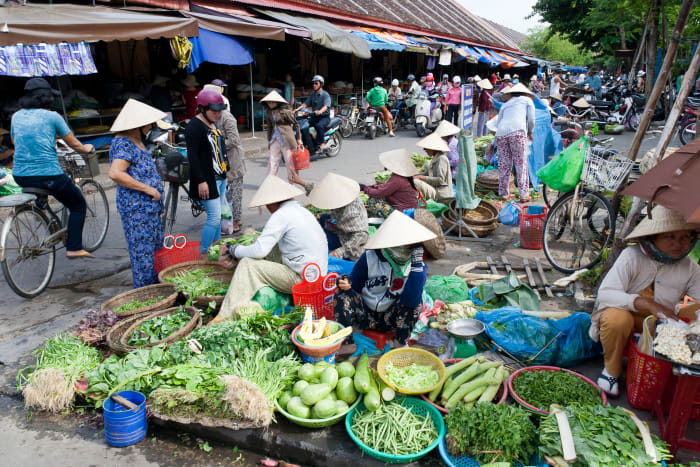 A busy street market in Hoi An, Vietnam