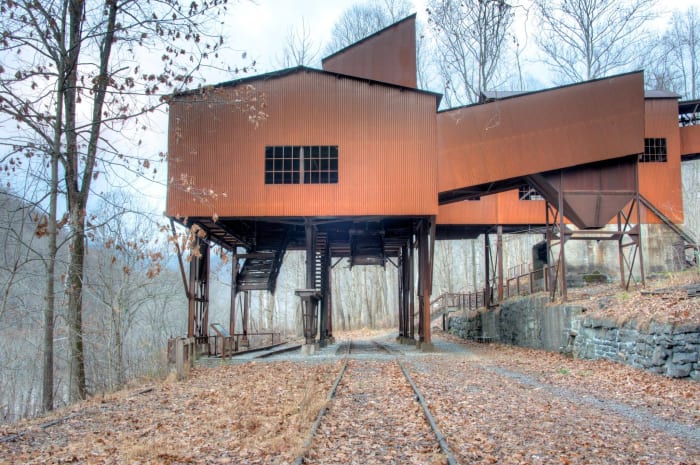 A short hike along a gravel road allows hikers to explore the Nuttall Coal Mine headhouse.