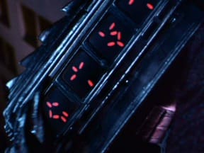 Very early GUI of the alien in Predator detonating a powerful explosive using some kind of lancet GUI. I even think some movie geeks found out what those symbols mean.