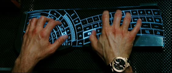 "Courtesy of Iron Man the movie....Tony Stark doing some engineering work on a wacked out keyboard not even in English."