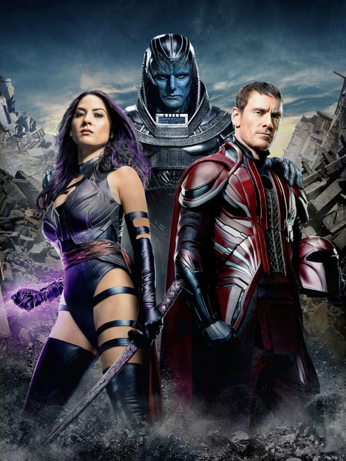 From left to right: Olivia Munn (as Psylocke), Oscar Isaac (as Apocalypse), and Michael Fassenbender (as Magneto). I can honestly say I am astounded by the amount of self-esteem to wear that outfit.