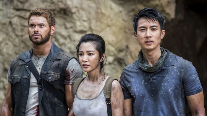 Kellan Lutz, Li Bingbing, and Wu Chun being dirty, shiny, and pretty after watching a giant queen spider's butt jostle with crawling baby spiders in, "7 Guardians of the Tomb."