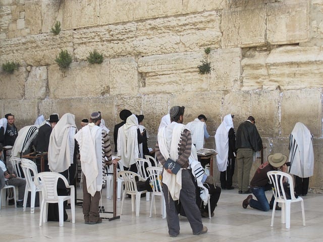 The Wailing Wall in Jerusalem, a sacred place for religious Jewish people. The wall is thought to be the last remaining part of the Jewish Temple, which was destroyed 2000 years ago by the Romans.