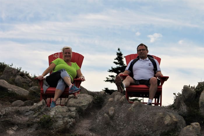 The Author and His Wife Kim Sitting in Adirondack Chairs Along the Ladies Lookout Trail. Parks Canada Has Installed a Number of These Chairs at Various Locations Along the Signal Hill Trail System, All of Which Look Out to Sea.