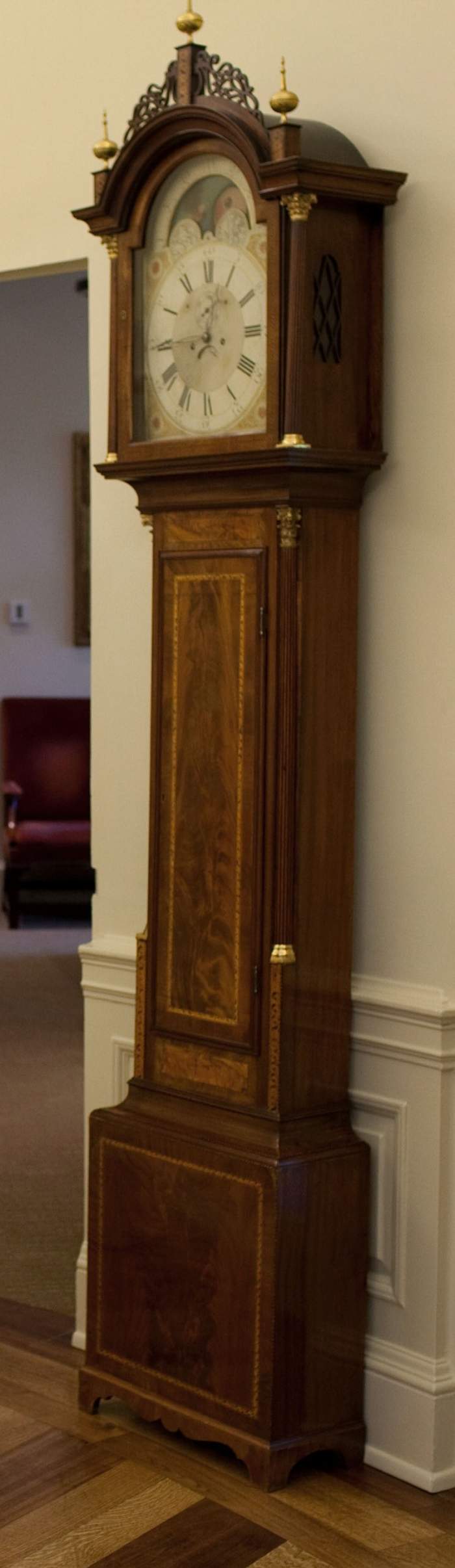 The Seymour Tall Case Clock has been a prominent fixture in the Oval Office since the Ford Administration.