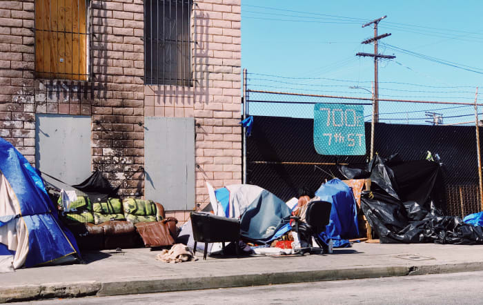 Homeless people can't get a place to live until they get a job... but can't get a job until they get a place to live.