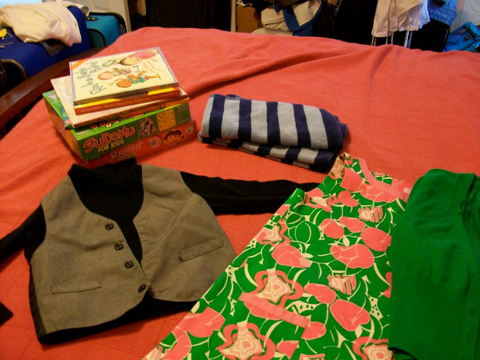 These are good items to donate. The clothes and towels are in good condition, the games have all their pieces, and the books don't have any teeth-marks on them.