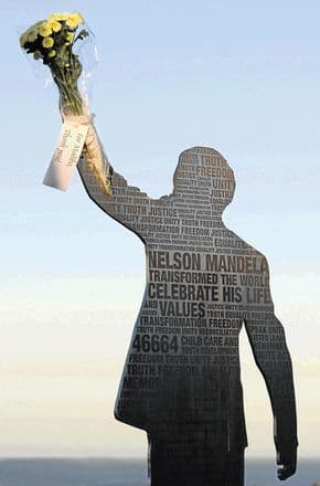 THANK YOU, MADIBA: an unknown Port Elizabeth resident paid silent homage to the elderly statesman by putting fresh flowers on the Mandela statue on the Donkin Reserve. The flowers, which were placed in the raised hand of the statue,