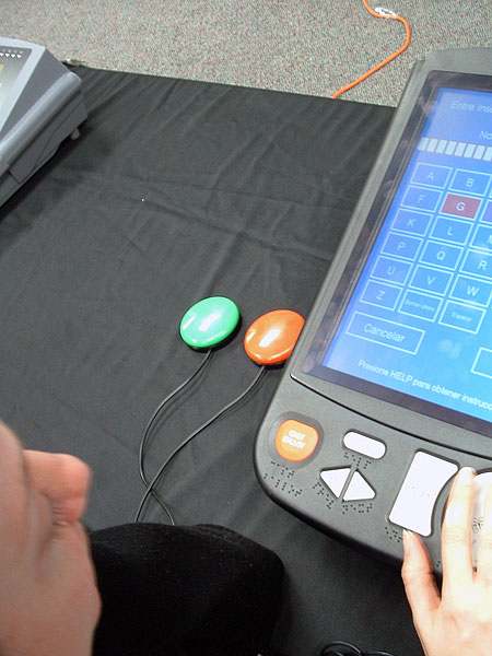 An accessible voting machine with "jelly buttons" which make the machine accessible for voters with manual dexterity disabilities. Image provided by Joseph Hall under Creative Commons Attribution-Share Alike 3.0 license.