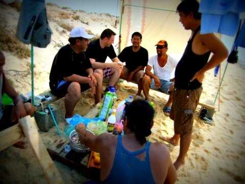 While waiting for the fishermen to come back with their Red Sea catch, these guys were either busy yakking or preparing the ingredients to make our sushi!